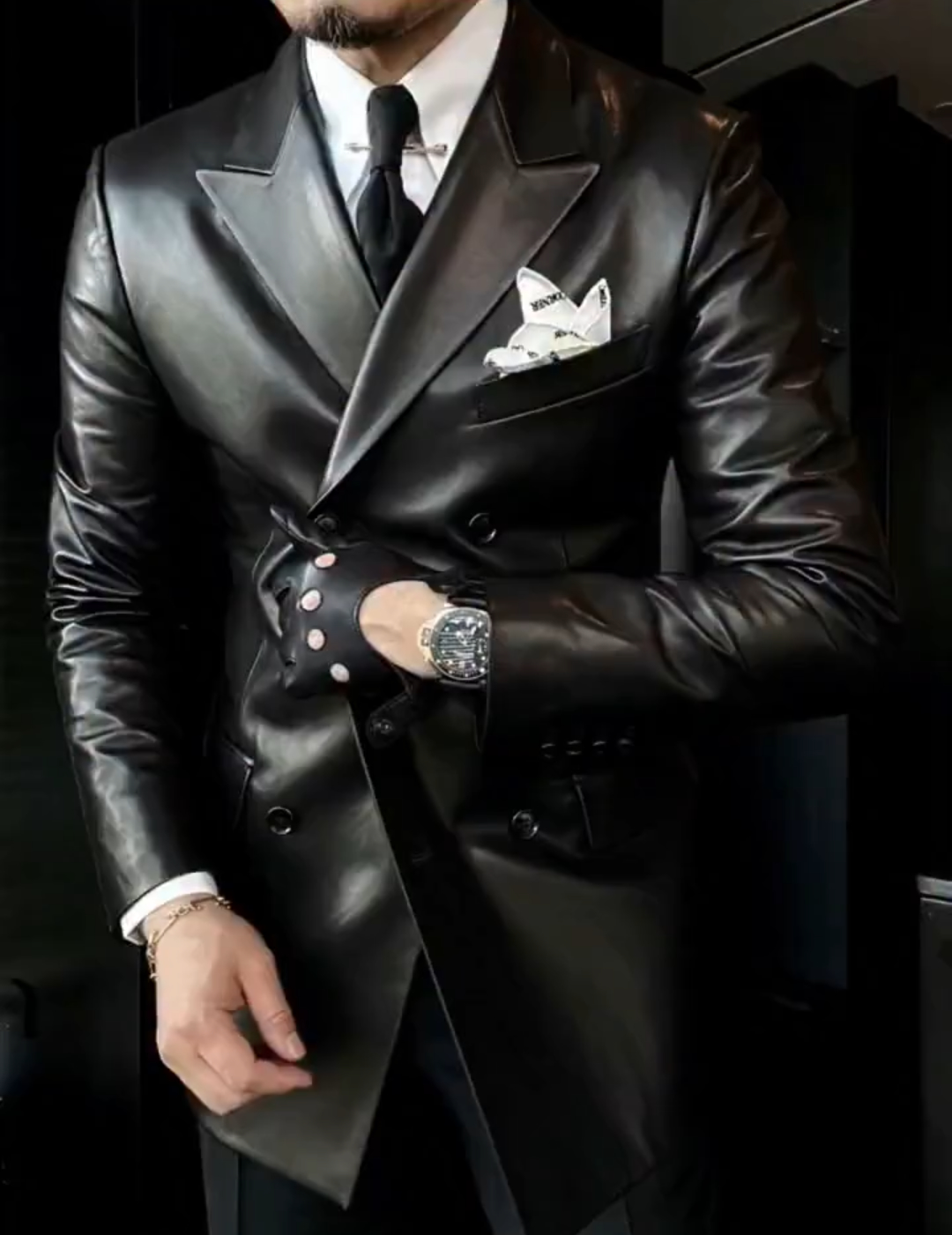 Double-breasted peak lapel suit